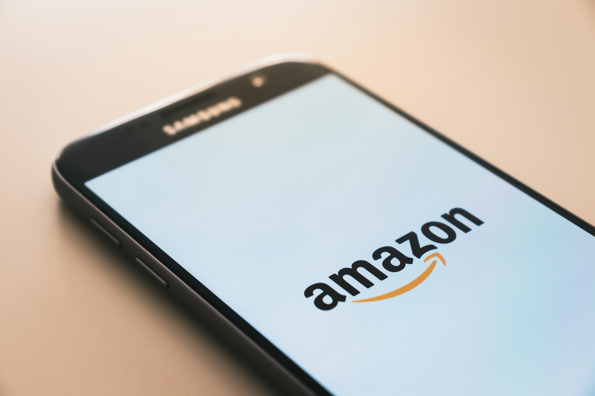A mobile phone screen showing the Amazon logo