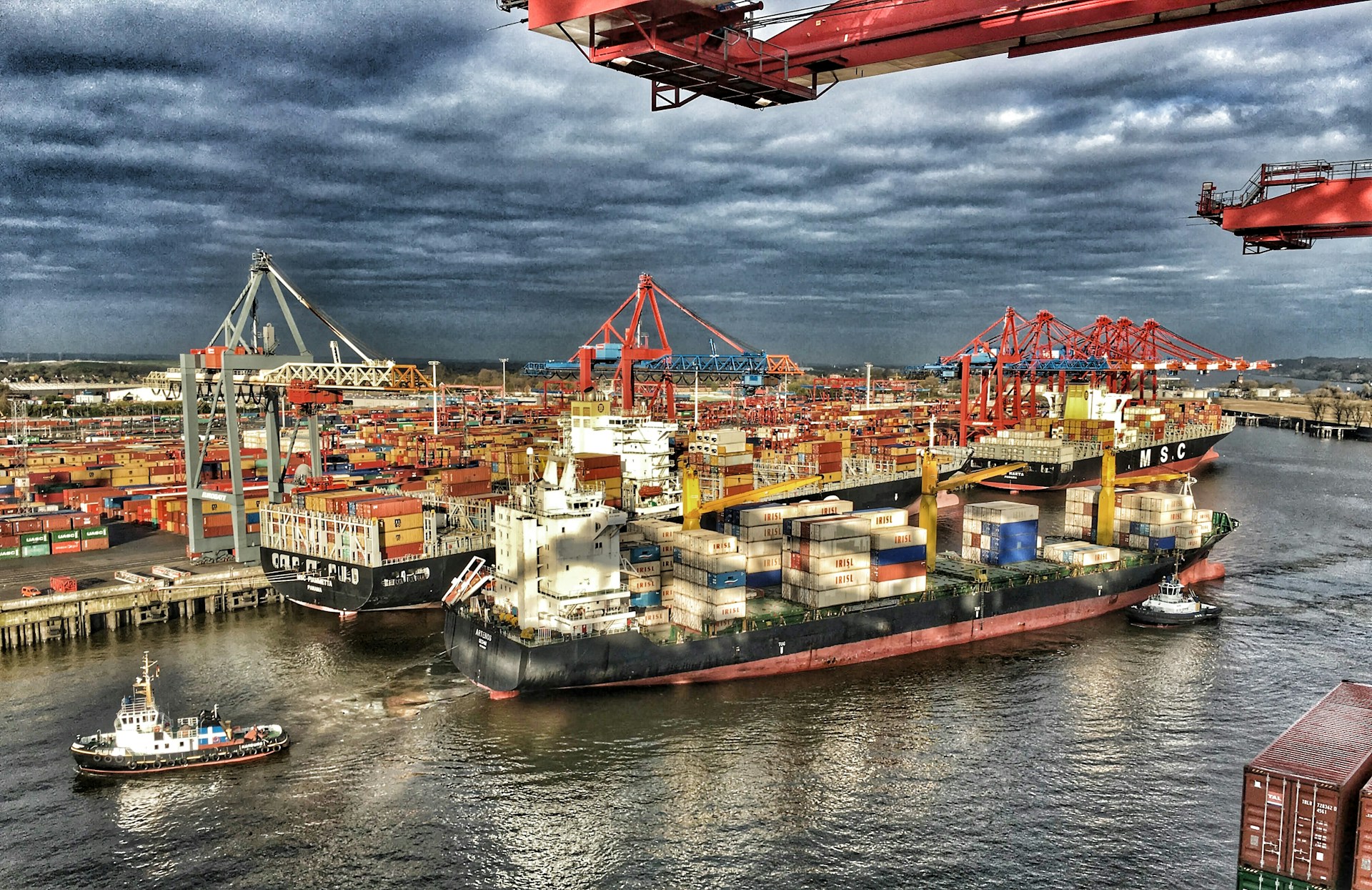 A large shipping container among others ready to embark