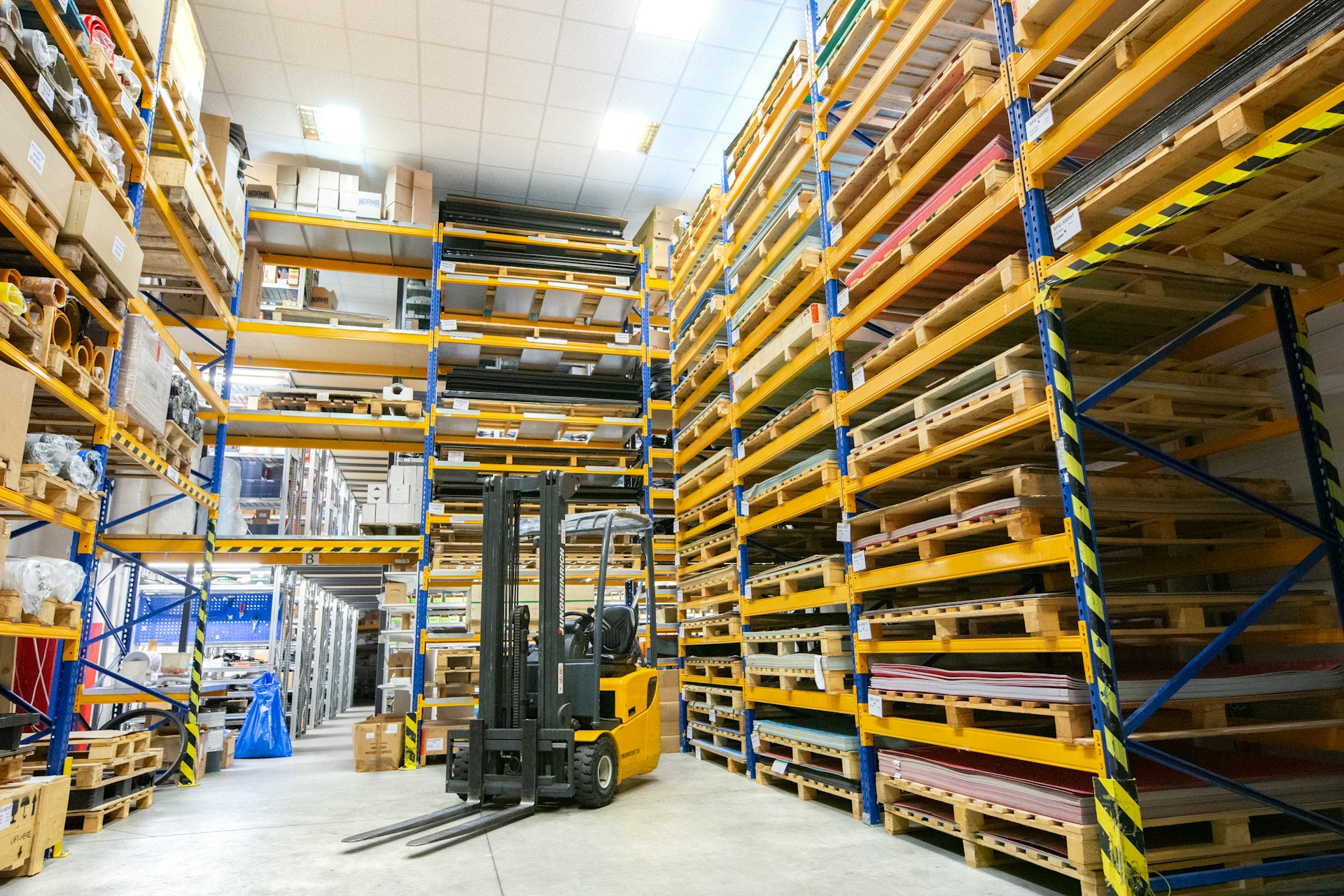 A warehouse with empty pallets ready to be stacked